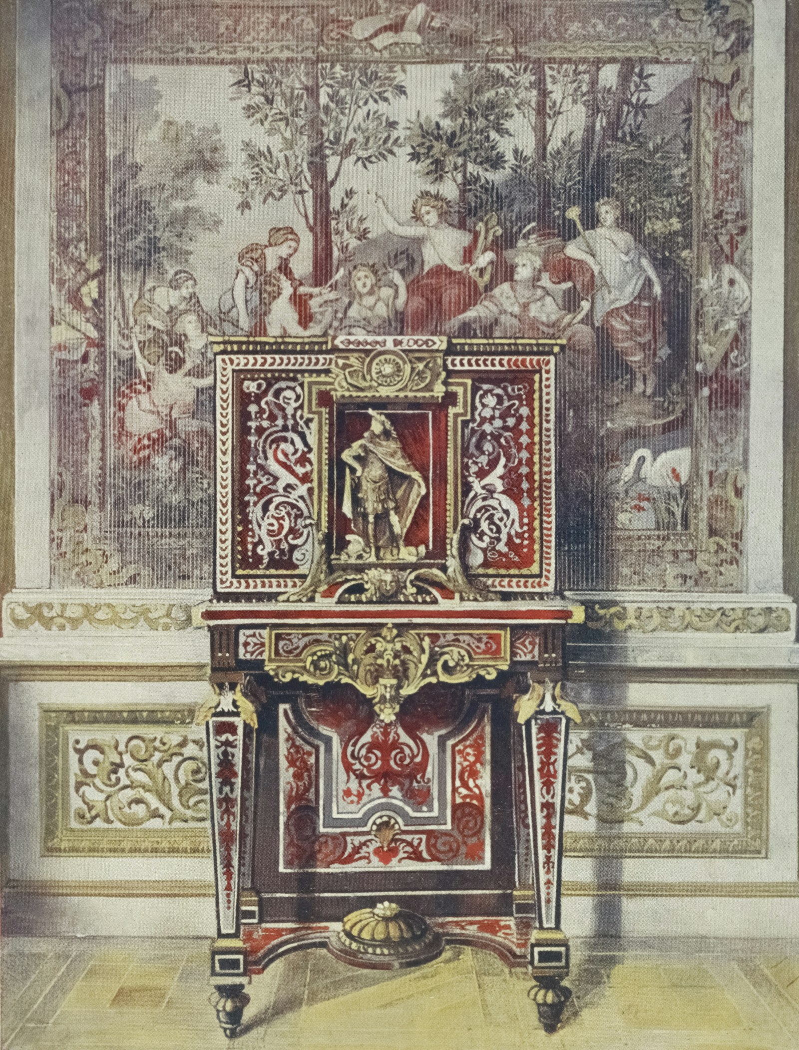Ornate antique cabinet with marquetry inlay and gilded decorative hardware
