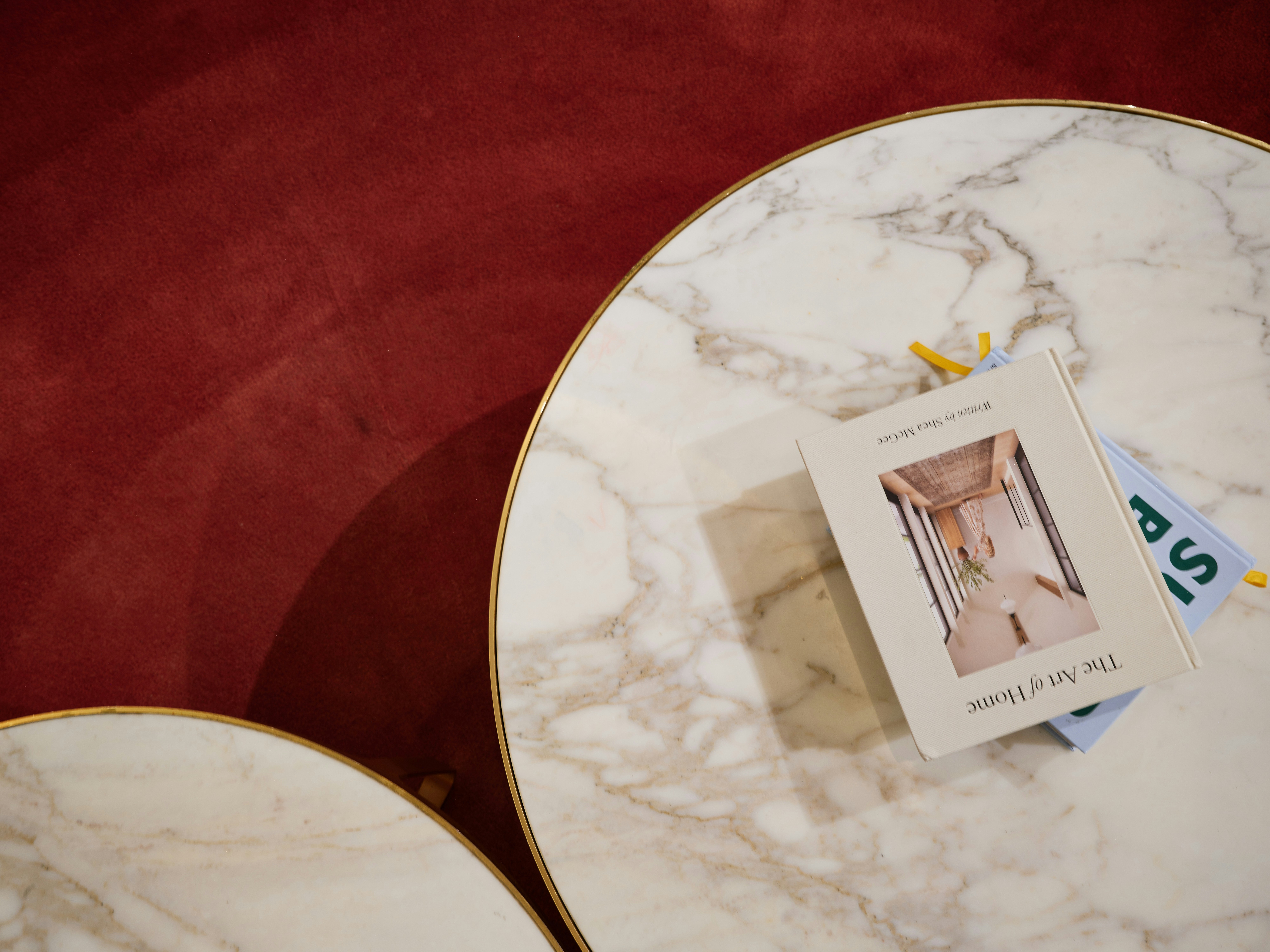 Designer marble coffee tables contemporary living room overhead view luxury styling