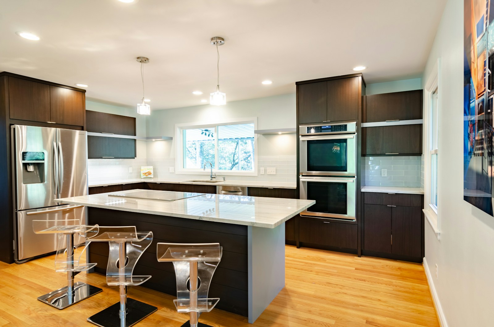 Contemporary custom kitchen cabinetry in neutral palette with seamless design