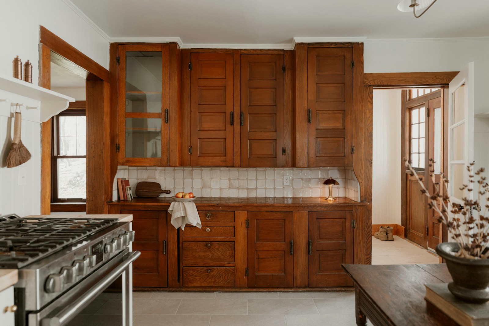 Custom cottage kitchen with painted wood cabinetry and vintage-inspired hardware