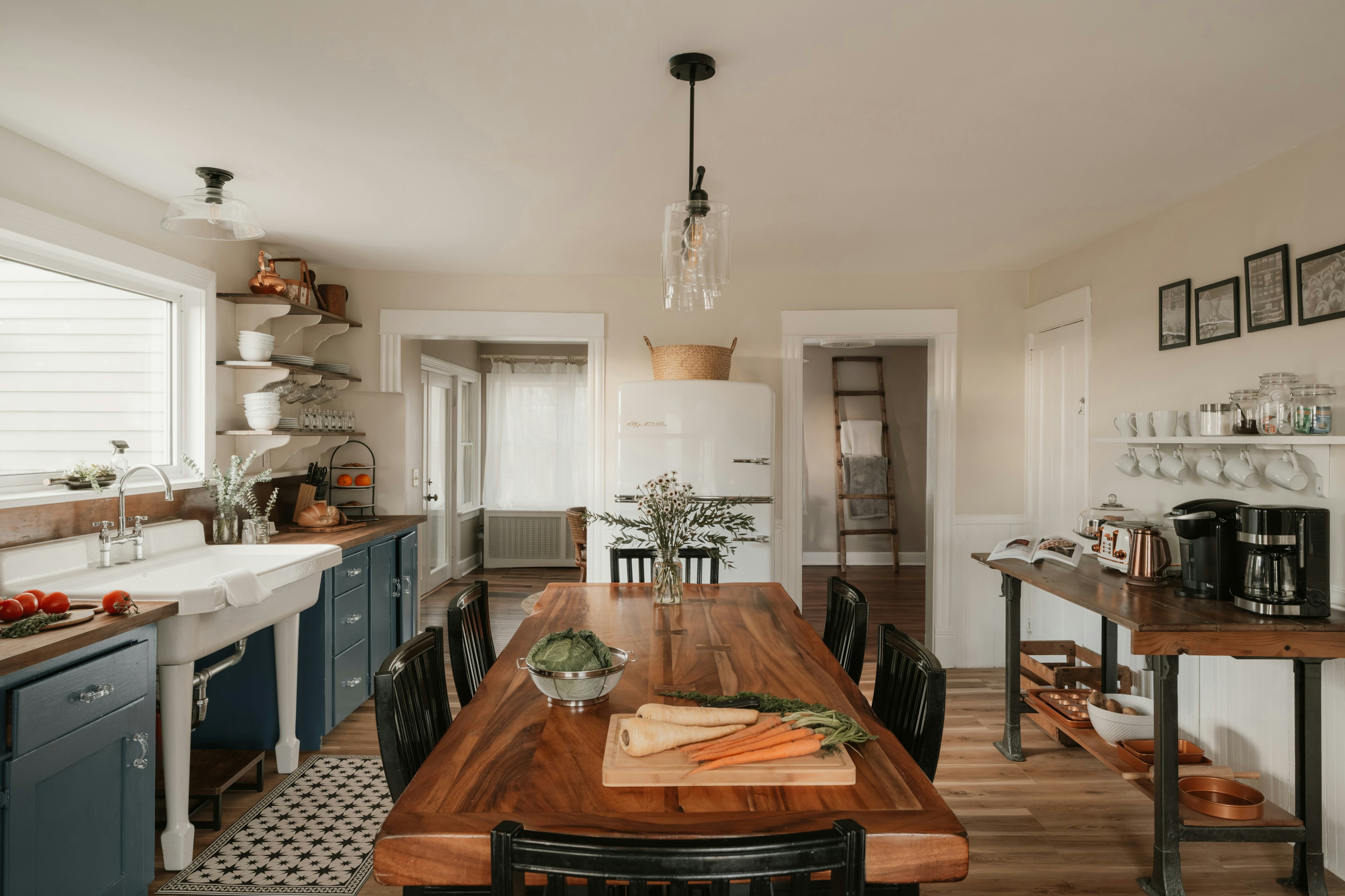 Cottage kitchen navy blue painted cabinets butcher block island farmhouse character