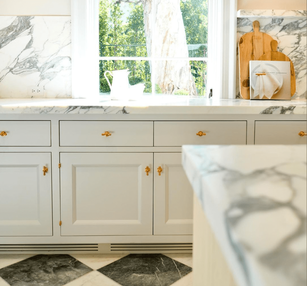White painted inset cabinetry with brass hardware and Calacatta marble backsplash and countertop, Irvine