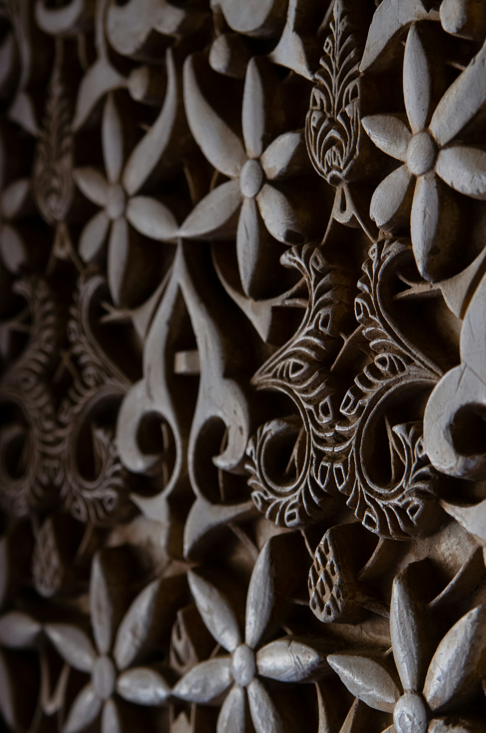 Decorative carved cabinet door with ornamental applied molding and antique detail