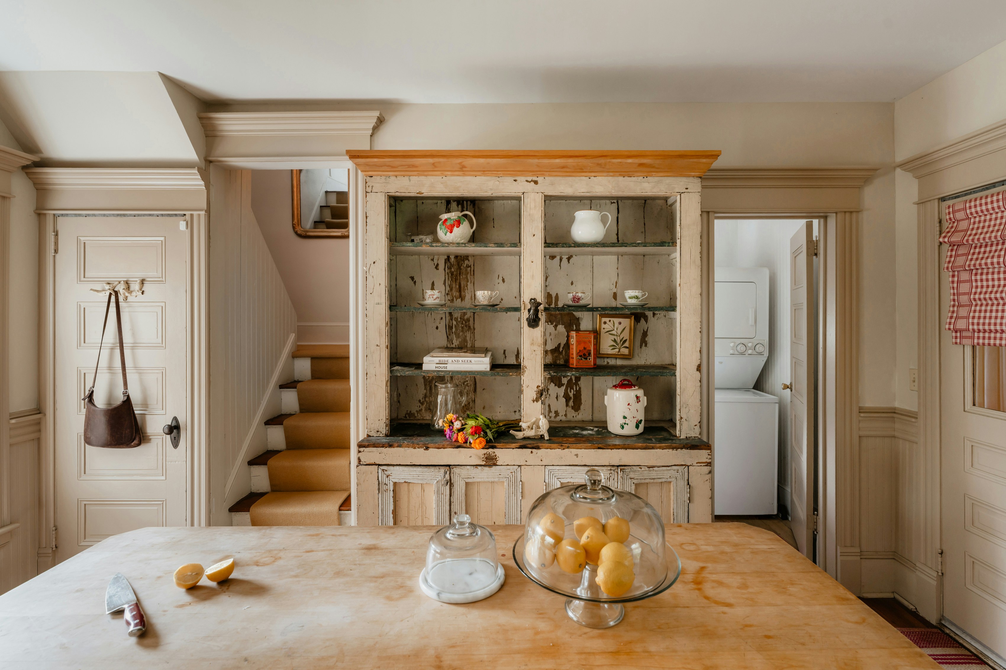 Shabby chic vintage kitchen distressed cream hutch open shelving romantic cottage charm