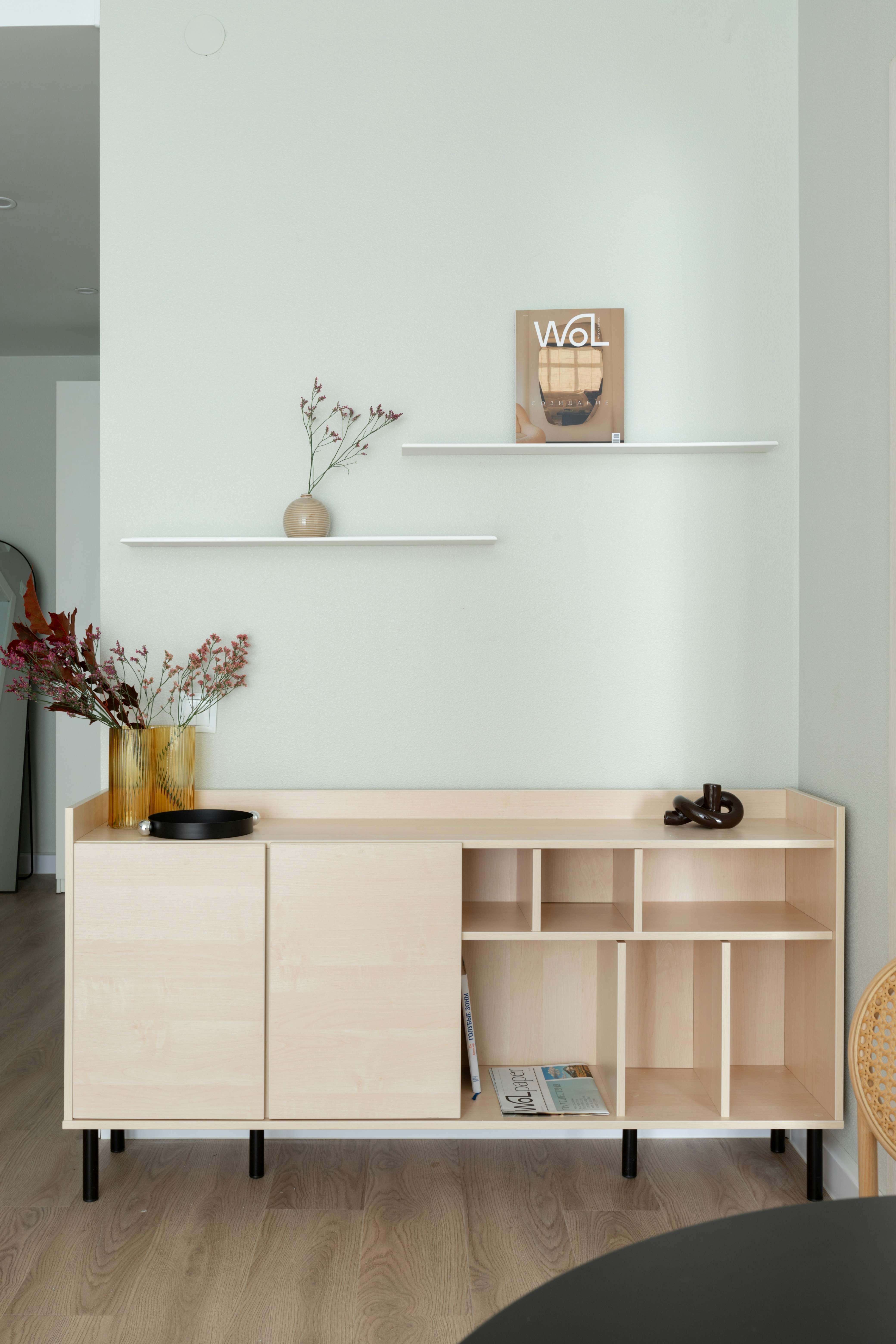 Scandinavian light wood sliding door sideboard black metal legs minimal interior