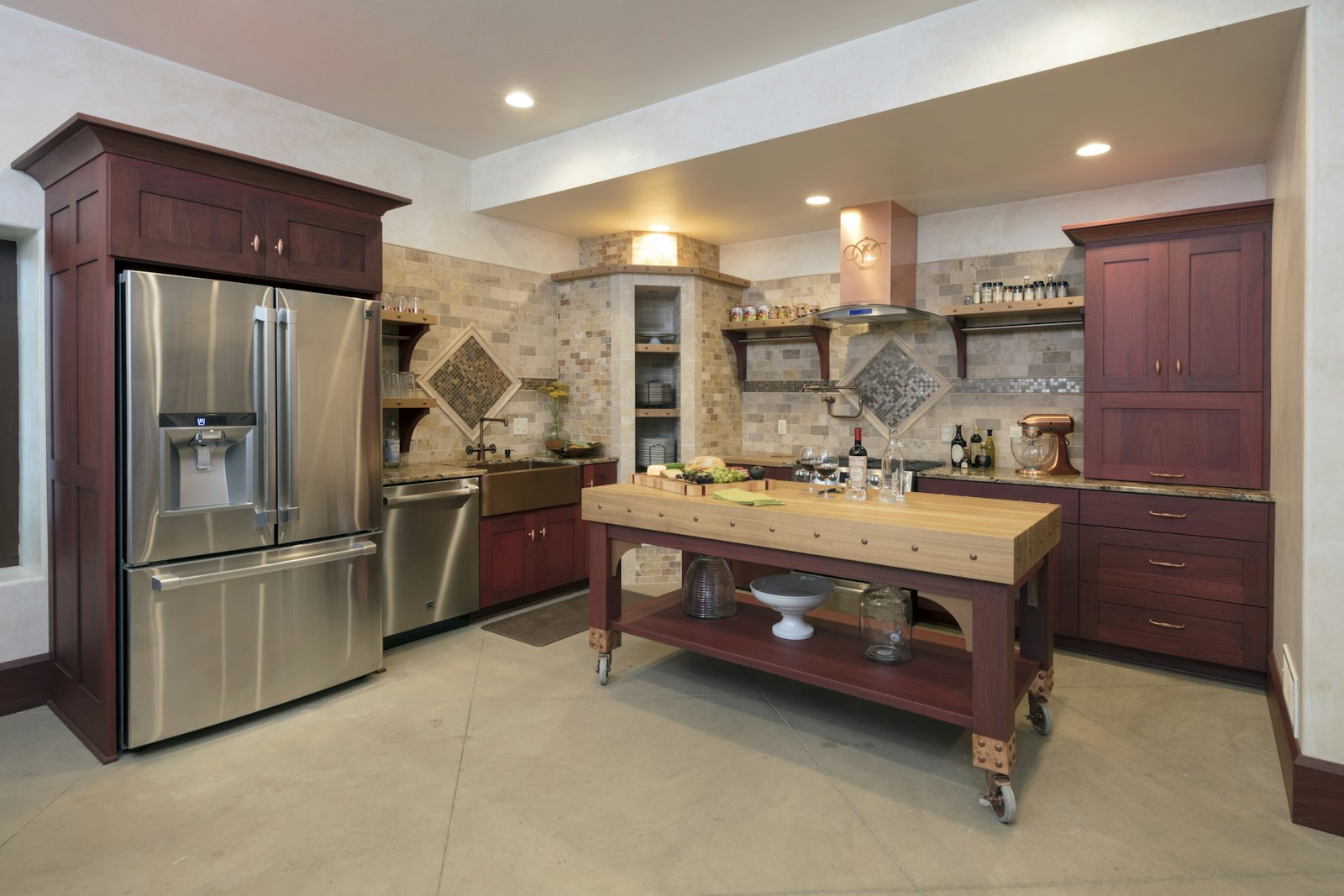 Traditional kitchen design with stained wood cabinetry and decorative corbels