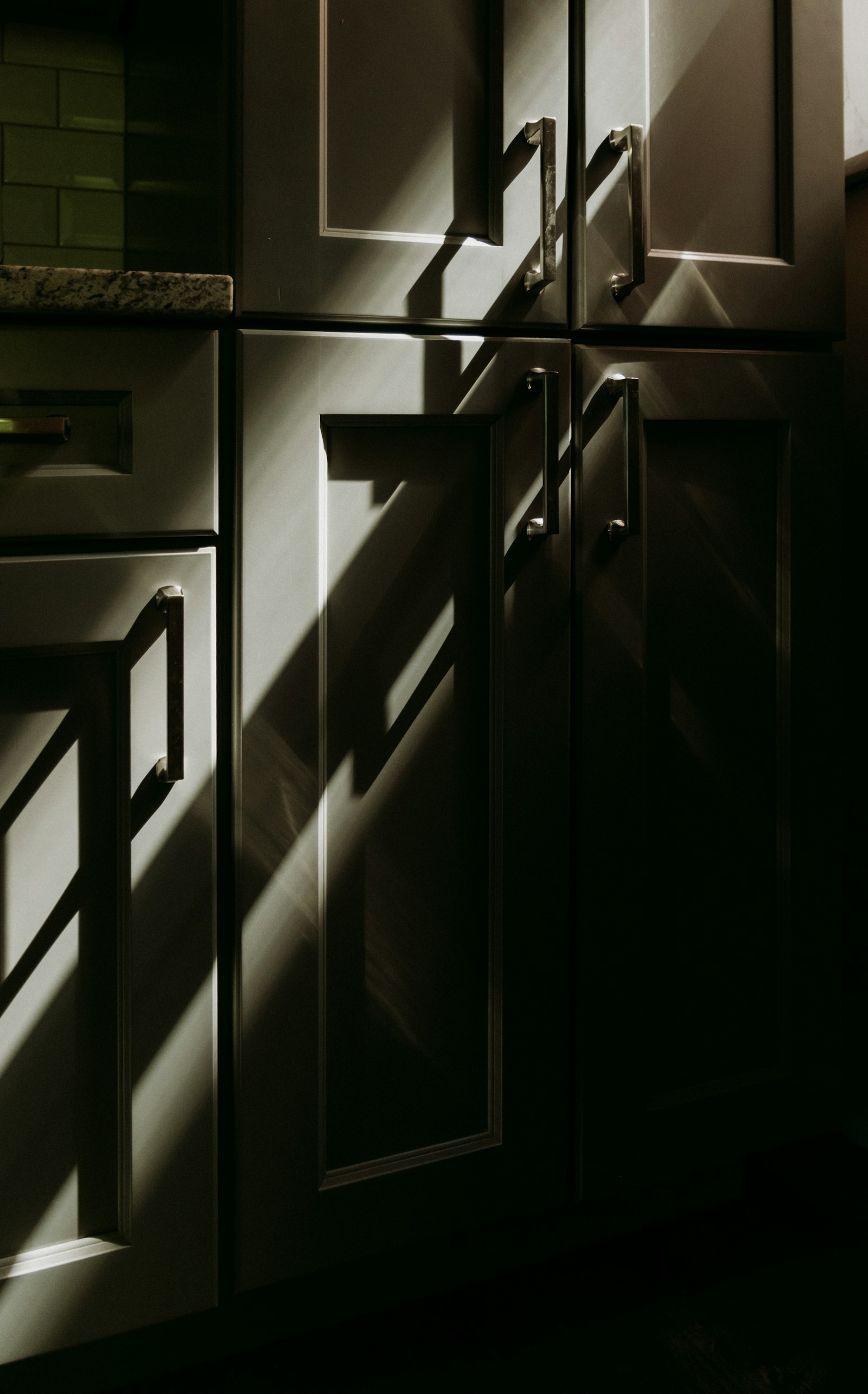 Classic traditional wood kitchen with raised panel doors and built-in details