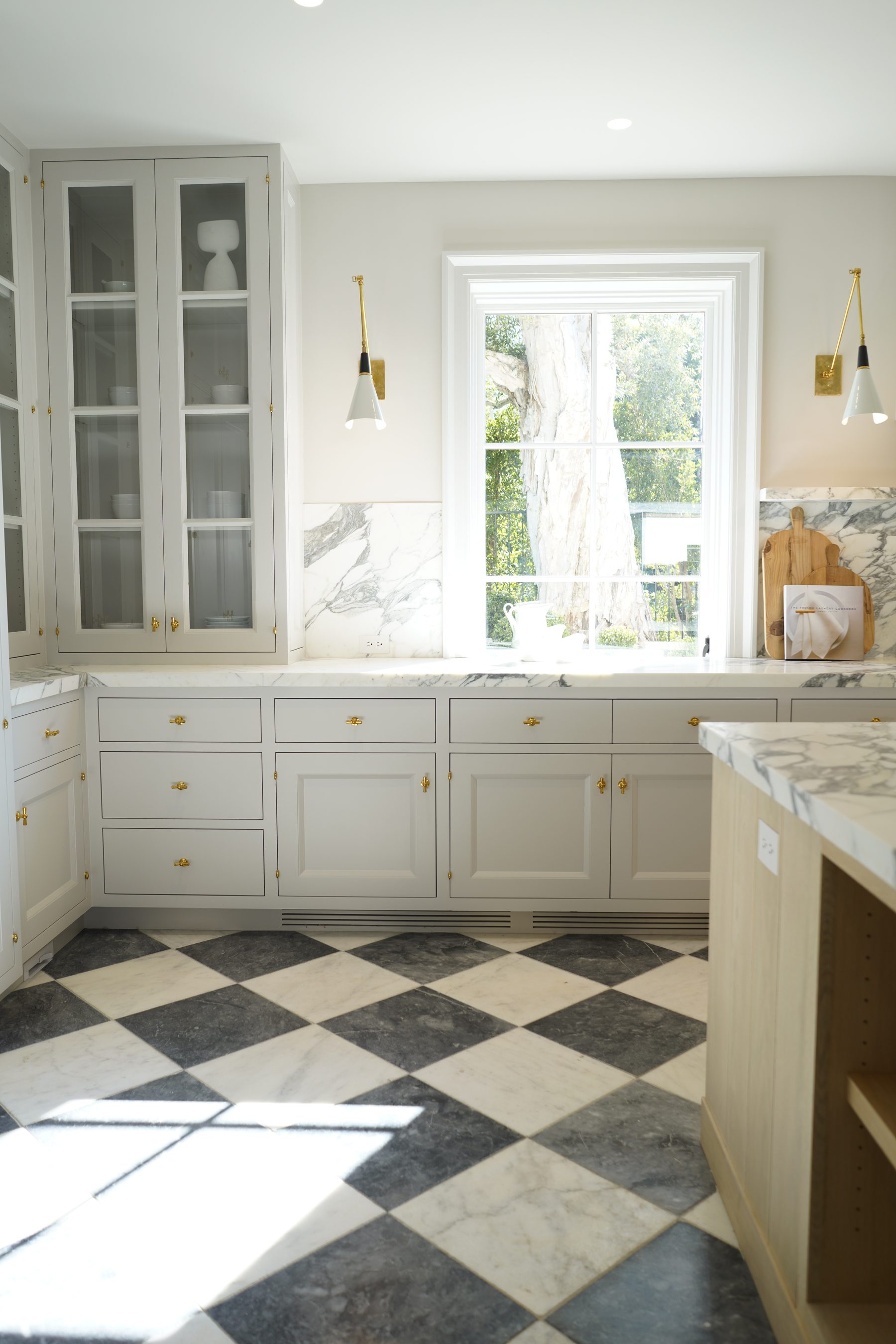 Custom white kitchen cabinet panel glass upper installation
