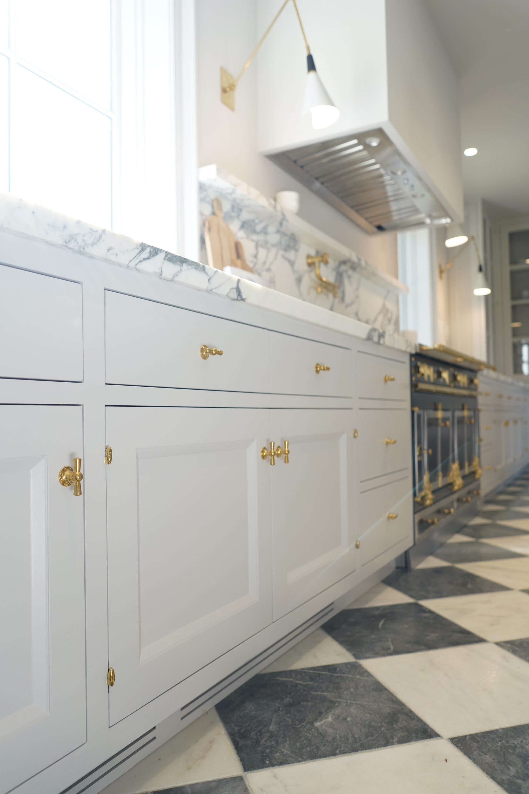 Custom white kitchen cabinet installation Bel Air angle view