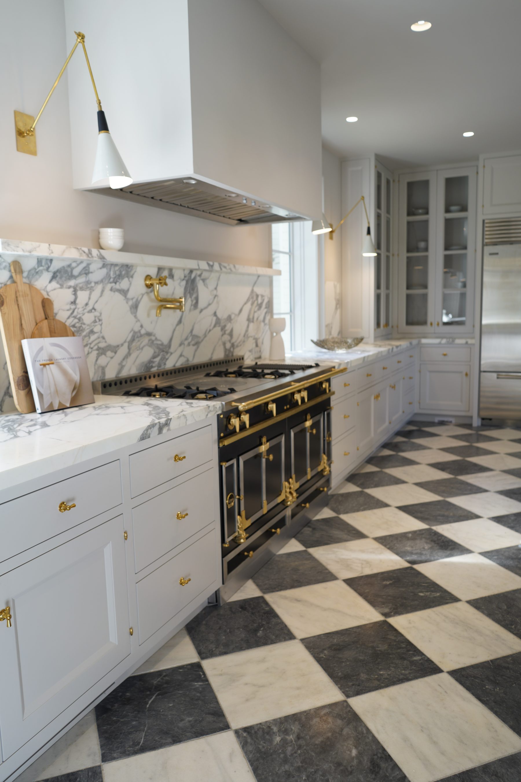 Custom white kitchen range wall cabinet detail installation
