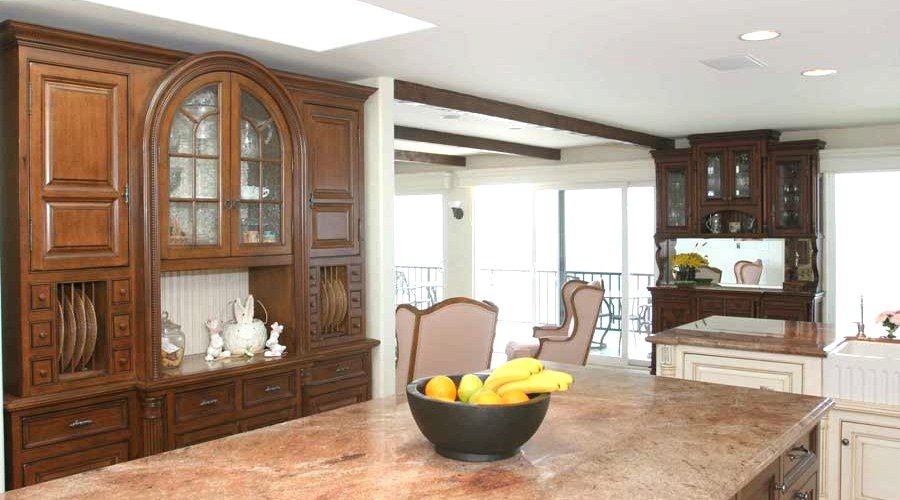 Custom walnut kitchen hutch cabinetry oceanfront view