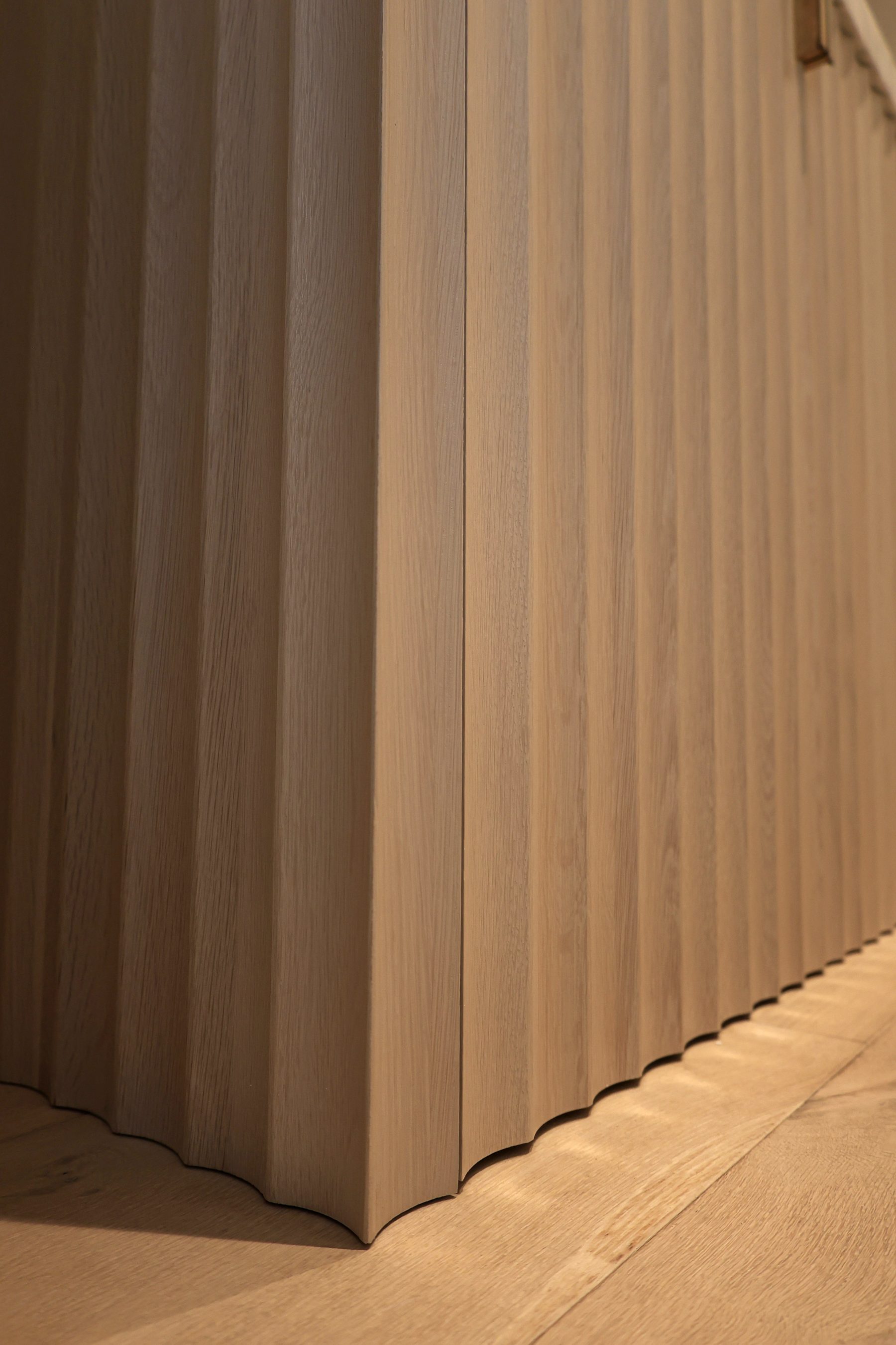 Custom fluted cabinet panel powder room detail Big Canyon