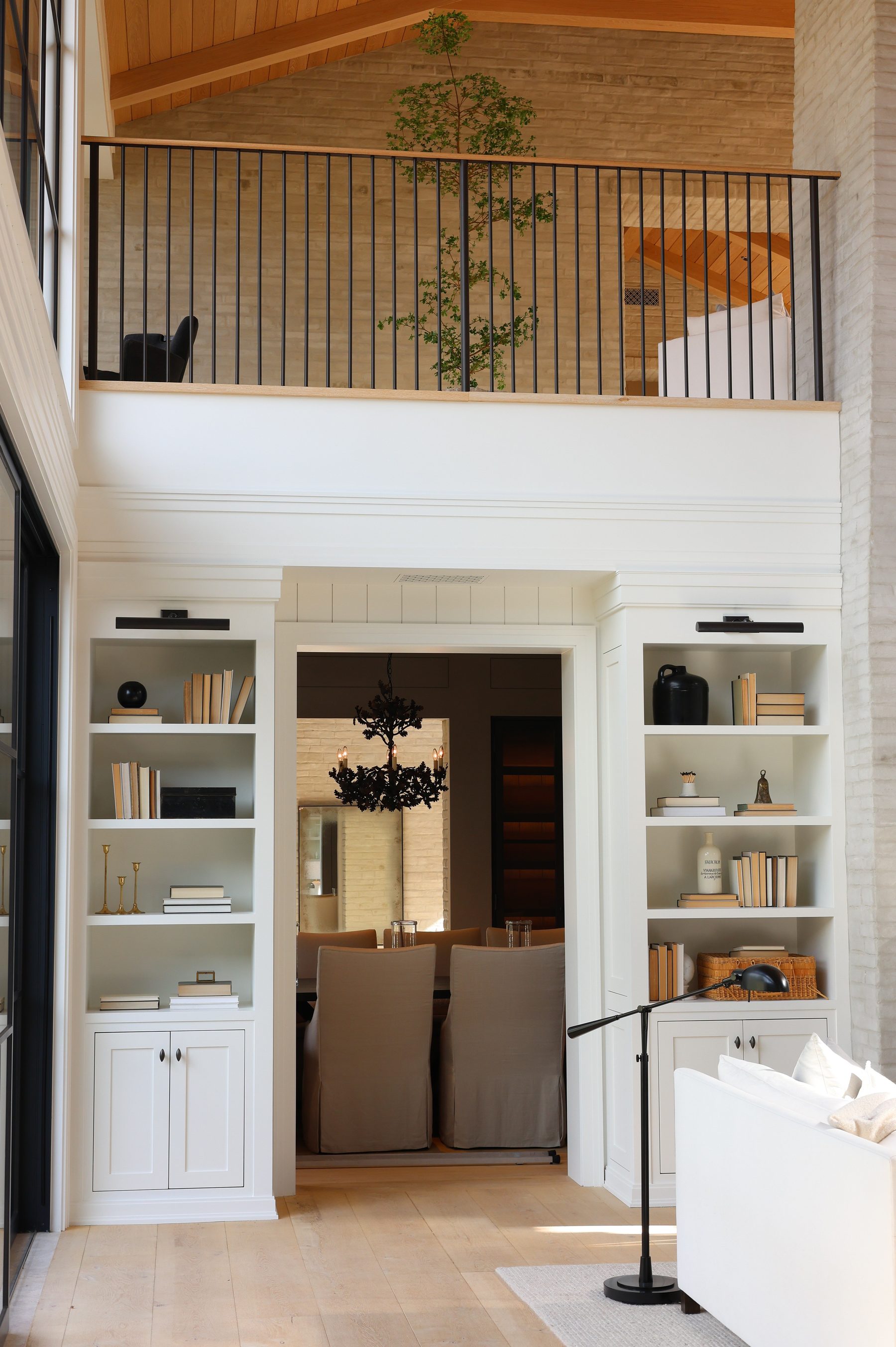 Custom white living room built-in bookshelves Big Canyon
