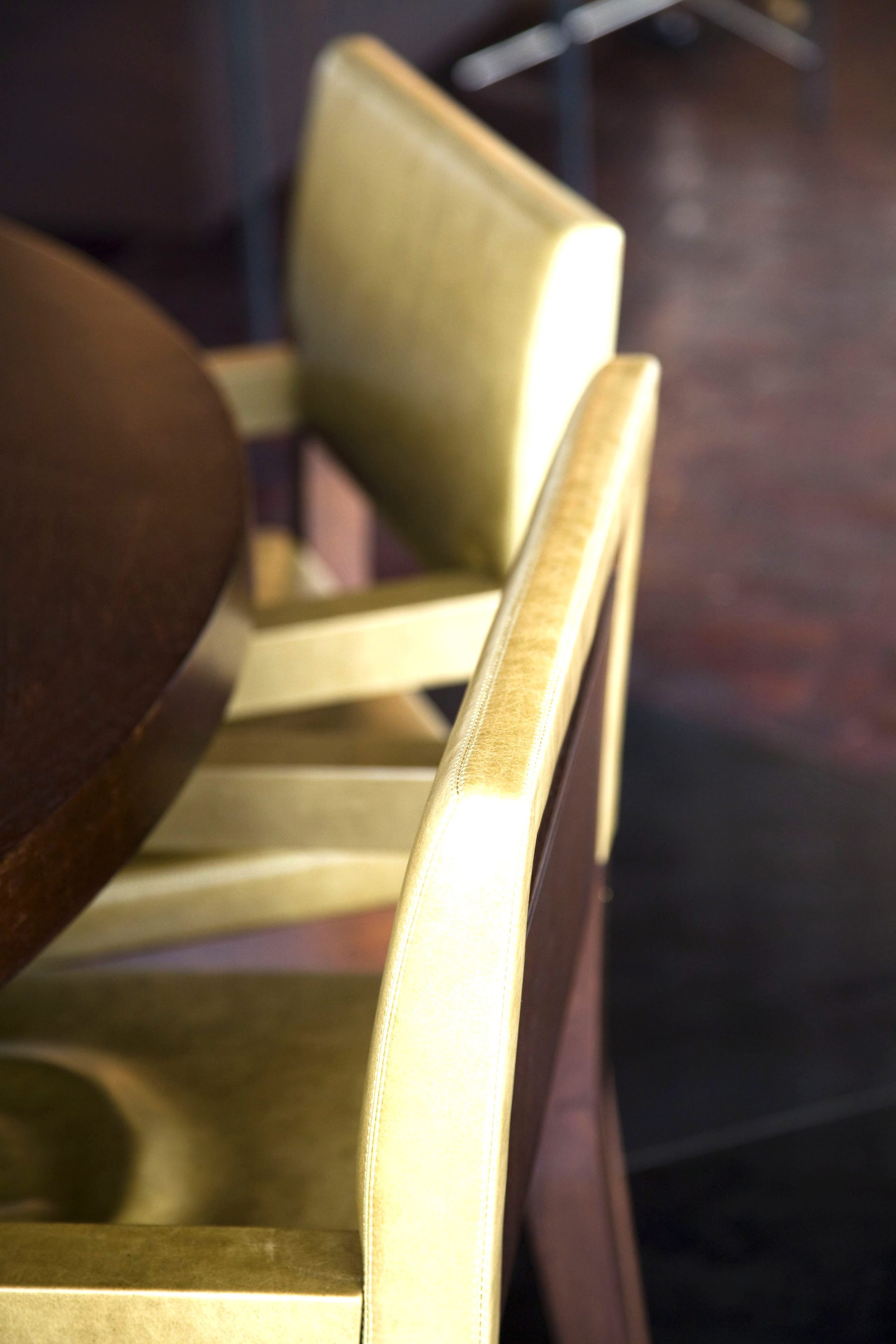 Luxury gold leather dining chair interior detail