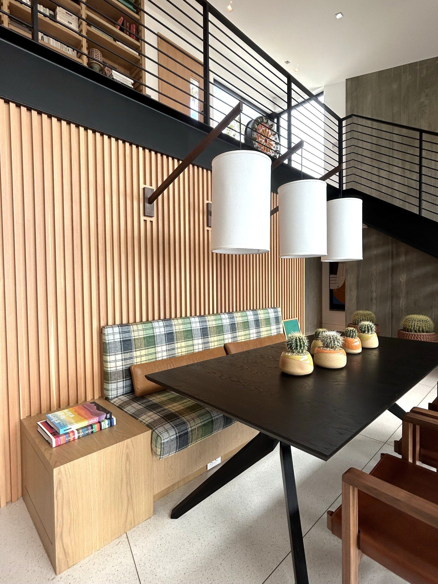 Custom modern built-in banquette seating fluted wood wall panel