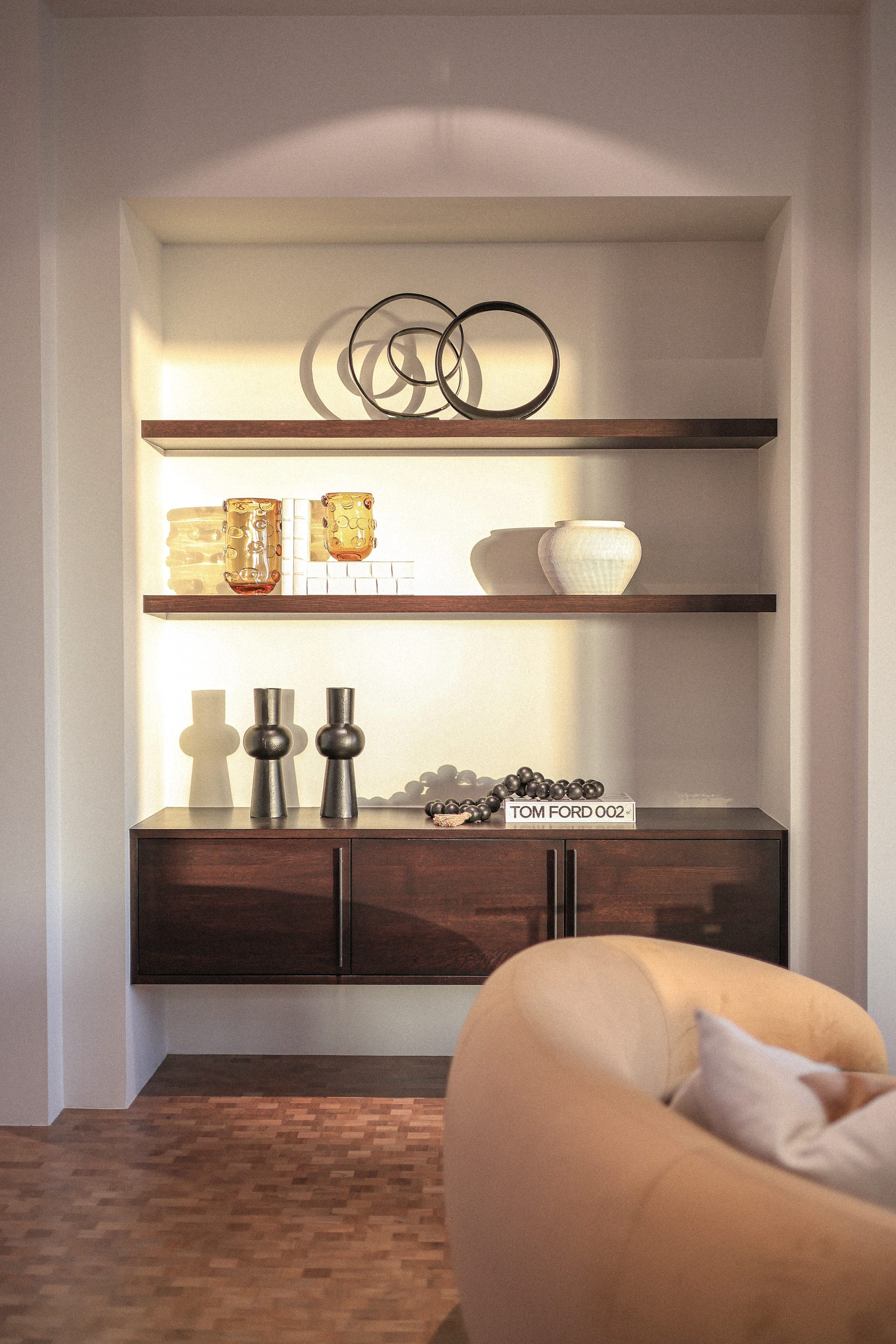 Modern dark floating cabinet backlit built-in niche shelving