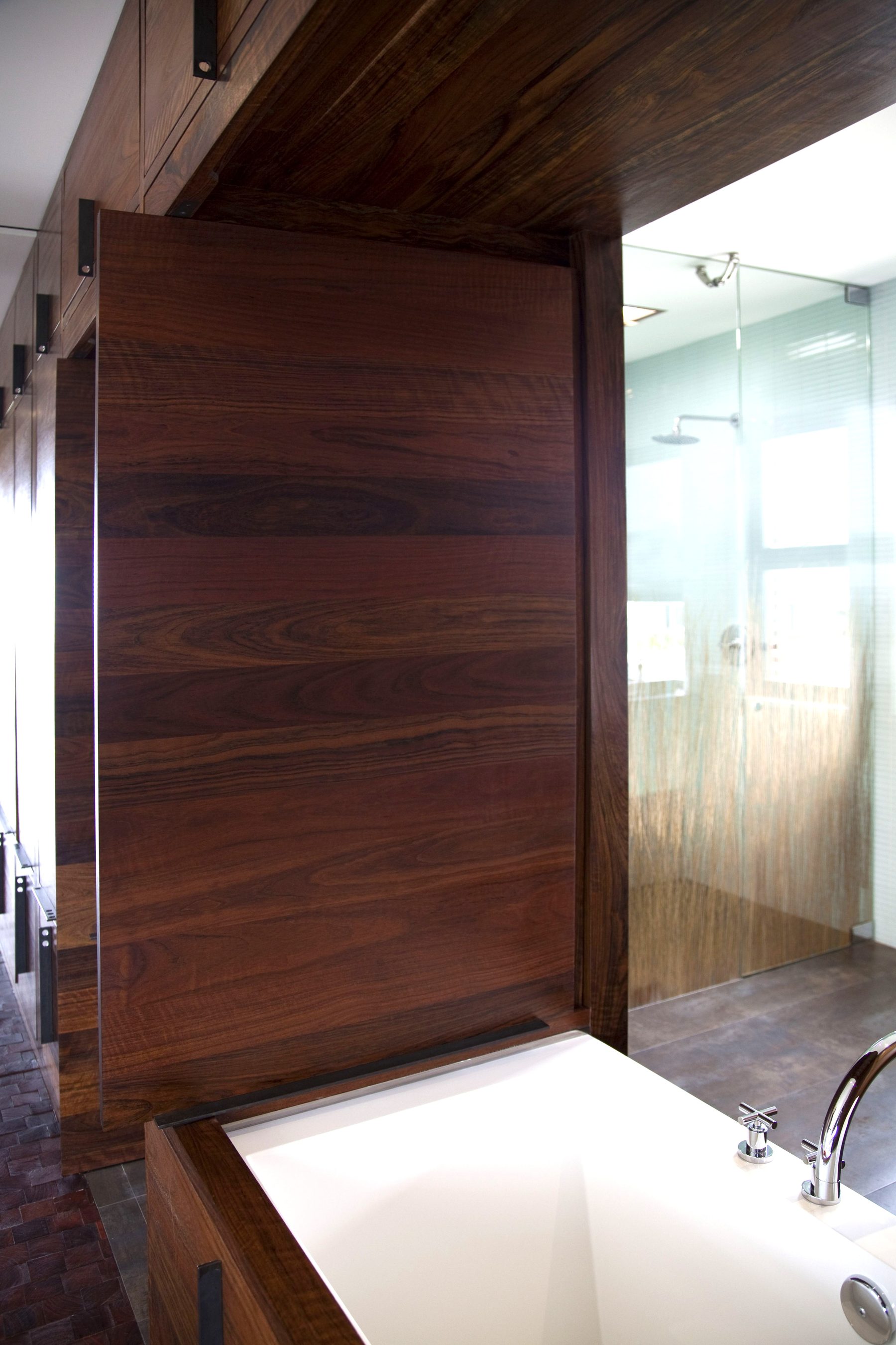 Custom walnut bathroom cabinet soaking tub Newport Beach