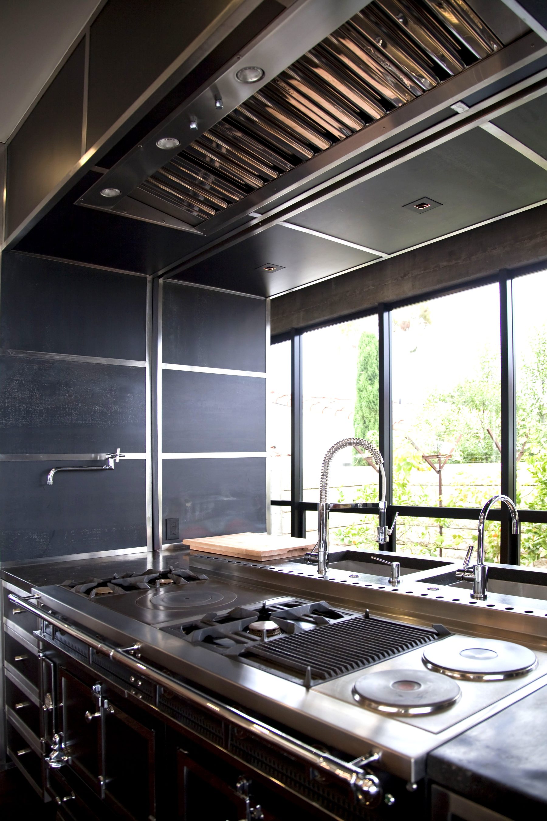 Black steel kitchen cabinetry professional range Newport Beach