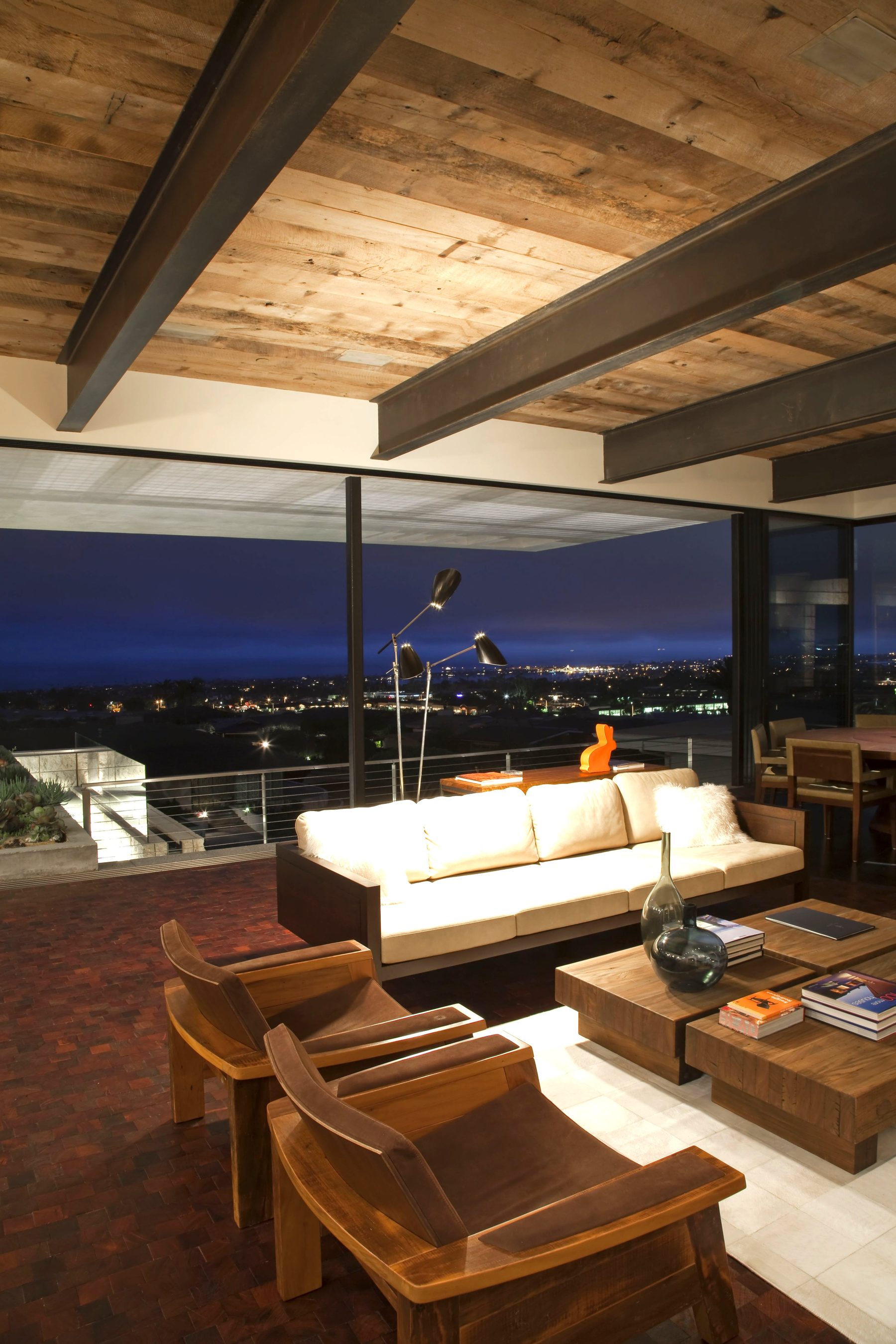 Newport Beach living room wood beam ceiling city lights
