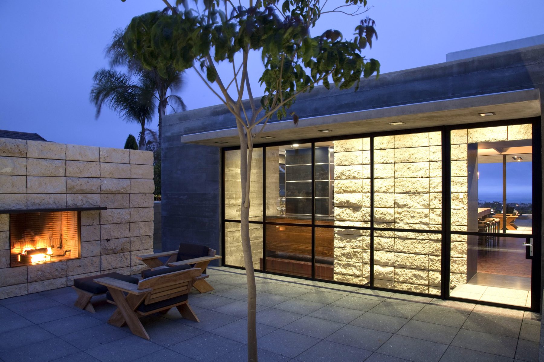 Newport Beach patio stone fireplace outdoor furniture