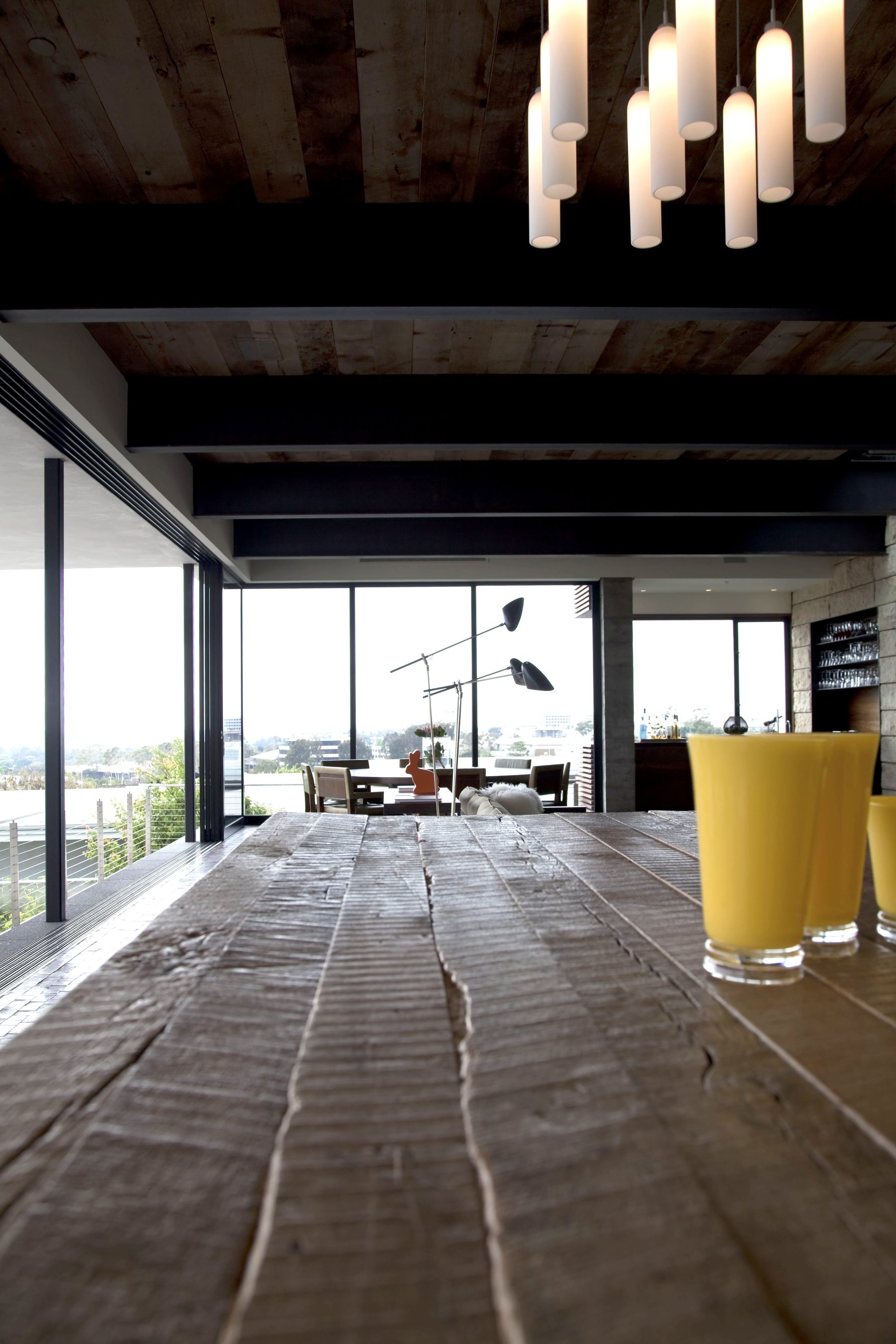 Newport Beach reclaimed wood dining room city lights view