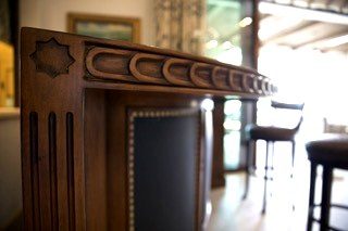 Custom carved bar corner molding egg-and-dart detail