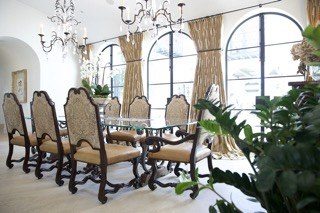 Ornate traditional dining room arched windows carved millwork