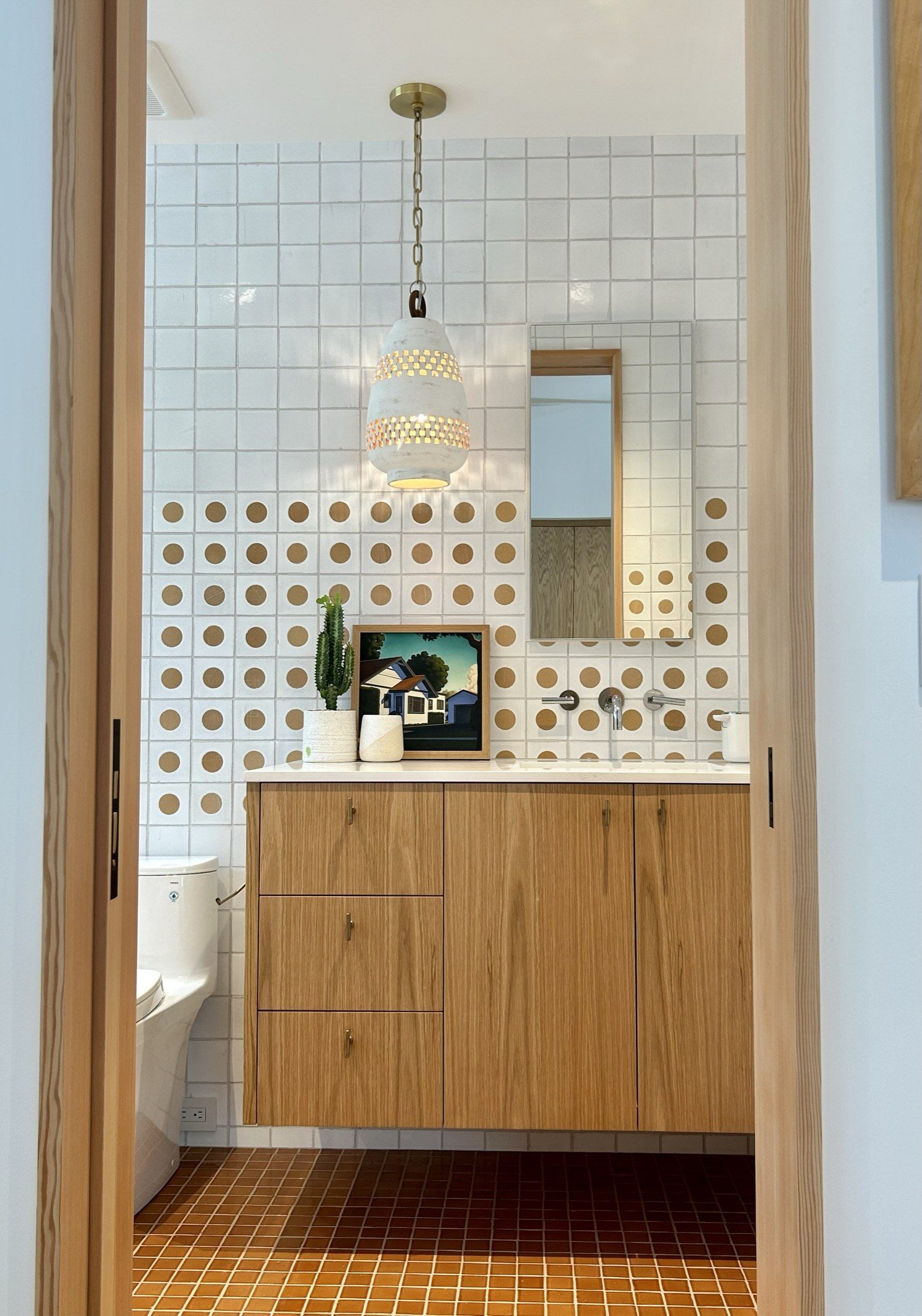 Custom white oak bathroom vanity polka dot tile wall
